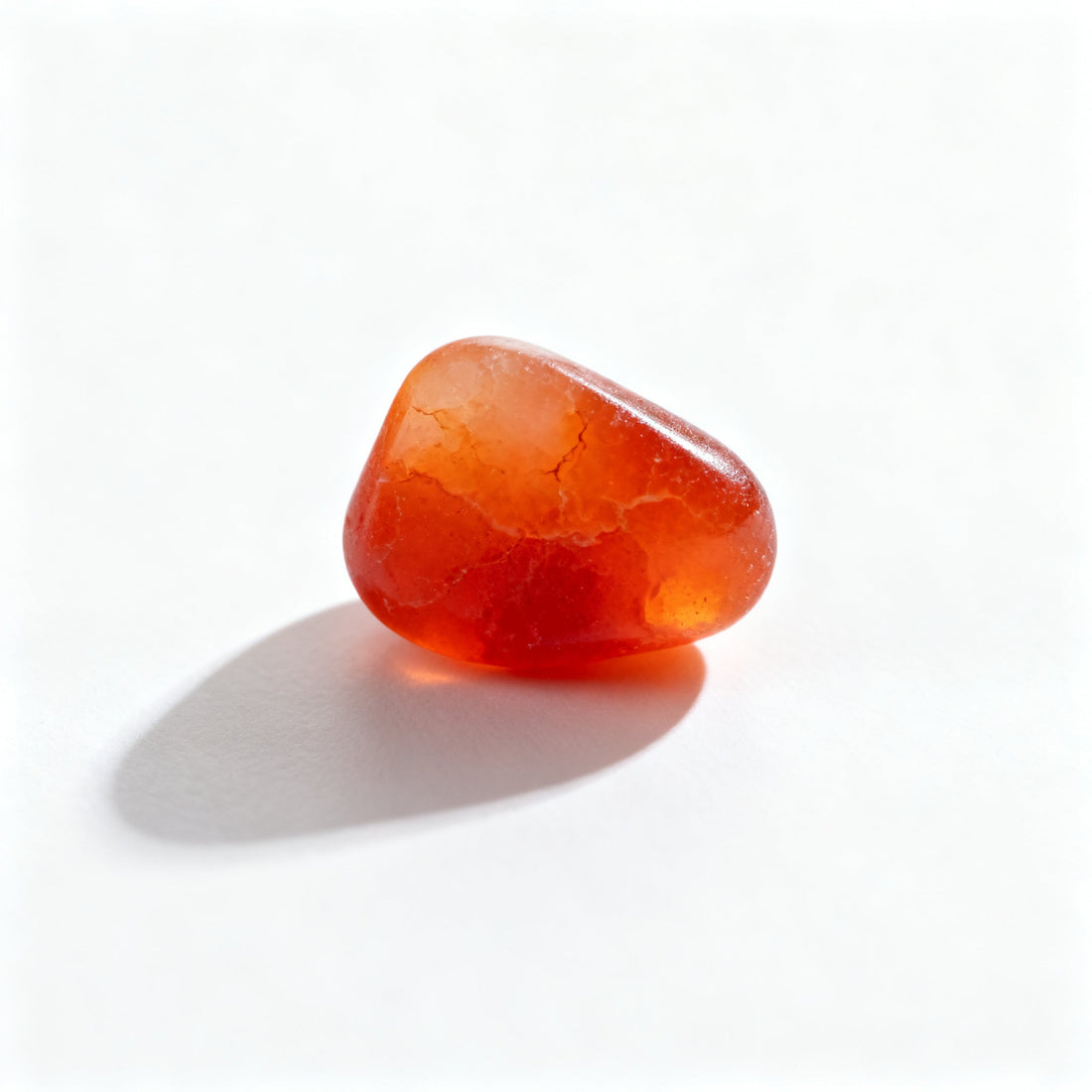 Polished carnelian beads showing warm orange-red chalcedony color