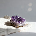 Premium Brazilian Amethyst crystal cluster showing deep purple formations