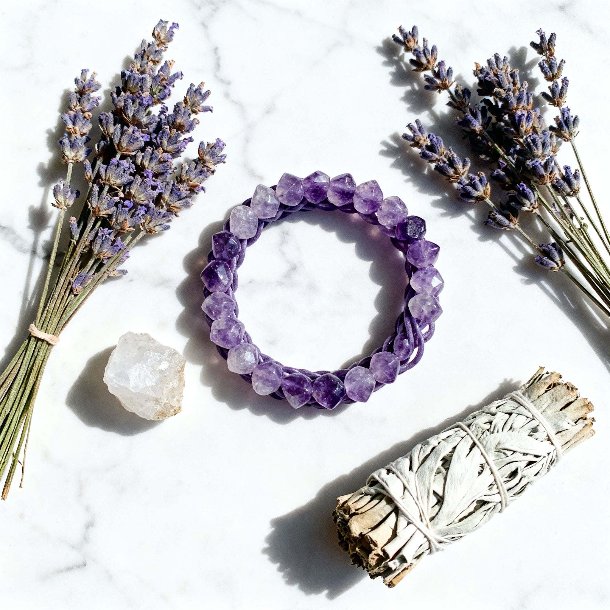 Amethyst bracelet flat lay with crystals and lavender - aesthetic composition