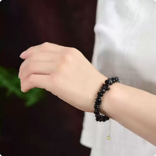 Black obsidian raw stone bracelet - real product photo